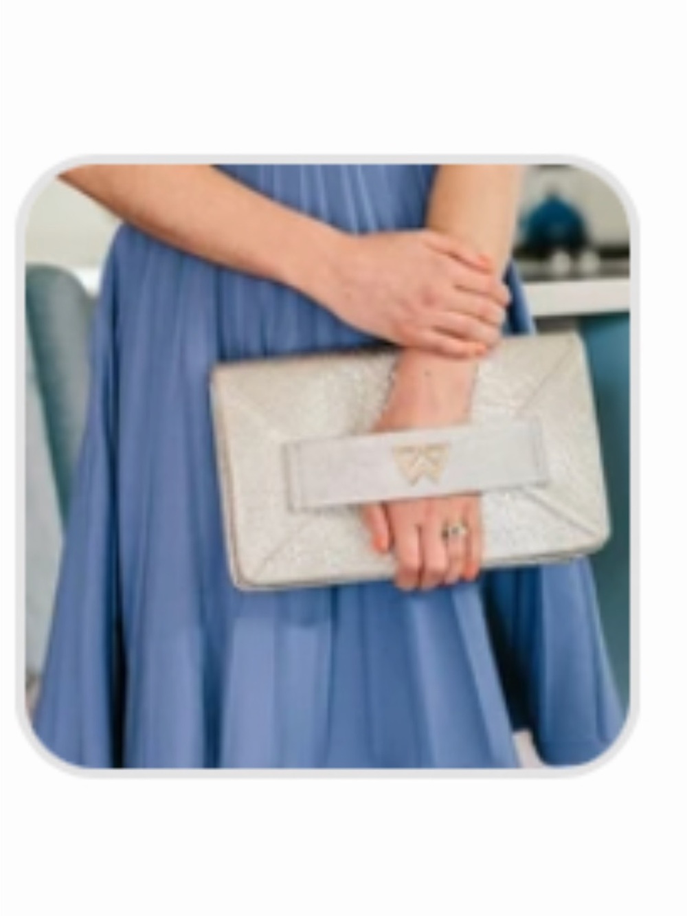 Kelly Wynne Forever Classy Clutch in Fine and
Dandelion